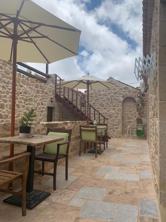 Vetilios Lithos Boutique Hotel Neo Oitilo Bagian luar foto