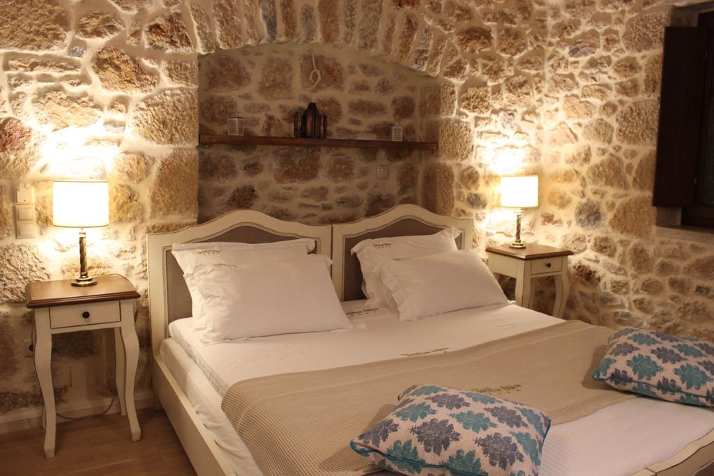 Vetilios Lithos Boutique Hotel Neo Oitilo Bagian luar foto